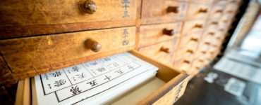 Tokyo, Japan - 15 March 2017: Omikuji (Paper Fortune) in a drawer at Senso ji. “Omikuji” is a strip of paper that predicts your fortune when you make a prayer to the gods and buddhas.