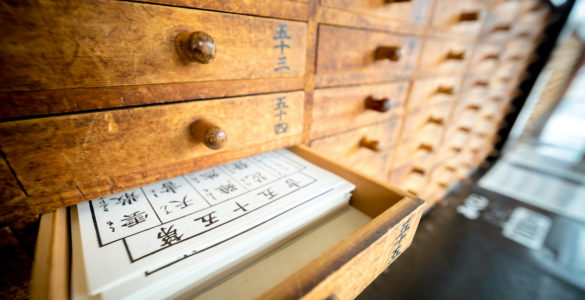 Tokyo, Japan - 15 March 2017: Omikuji (Paper Fortune) in a drawer at Senso ji. “Omikuji” is a strip of paper that predicts your fortune when you make a prayer to the gods and buddhas.