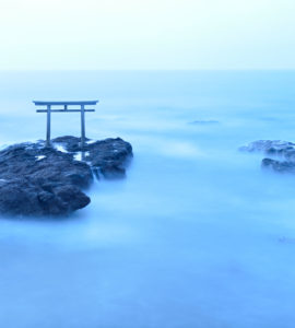 Torii - gateway of shrine in the sea in the early morning by long