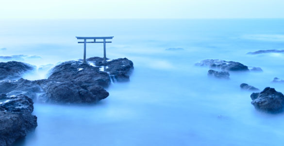 Torii - gateway of shrine in the sea in the early morning by long